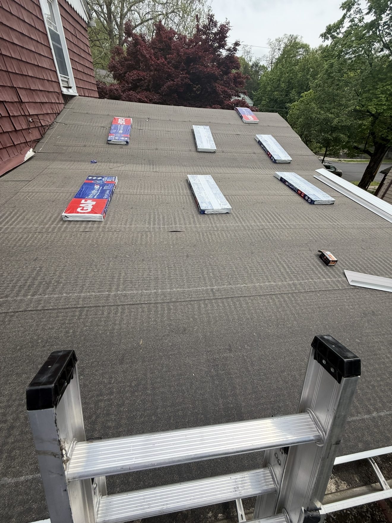 Close-up detail of a freshly installed architectural shingle roof